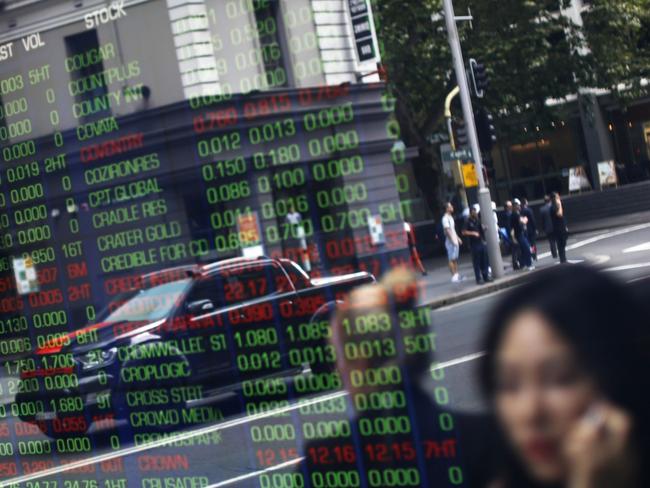 Pedestrians are reflected in a window as they walk  past an electronic stock board at the ASX Ltd. exchange centre in Sydney, Australia, on Thursday, Feb. 14, 2019. âWe made good progress on our core initiatives across the period, including the program to replace CHESS with distributed ledger technology; upgrade of our secondary data centre to strengthen market resilience; and restructure of our Listings Compliance team to enhance the quality of market oversight,â ASX Chief Executive Officer Dominic Stevens said. Photographer: David Moir/Bloombergrket resilience; and restructure of our Listings Compliance team to enhance the quality of market oversight,â ASX Chief Executive Officer Dominic Stevens said. Photographer: David Moir/Bloomberg