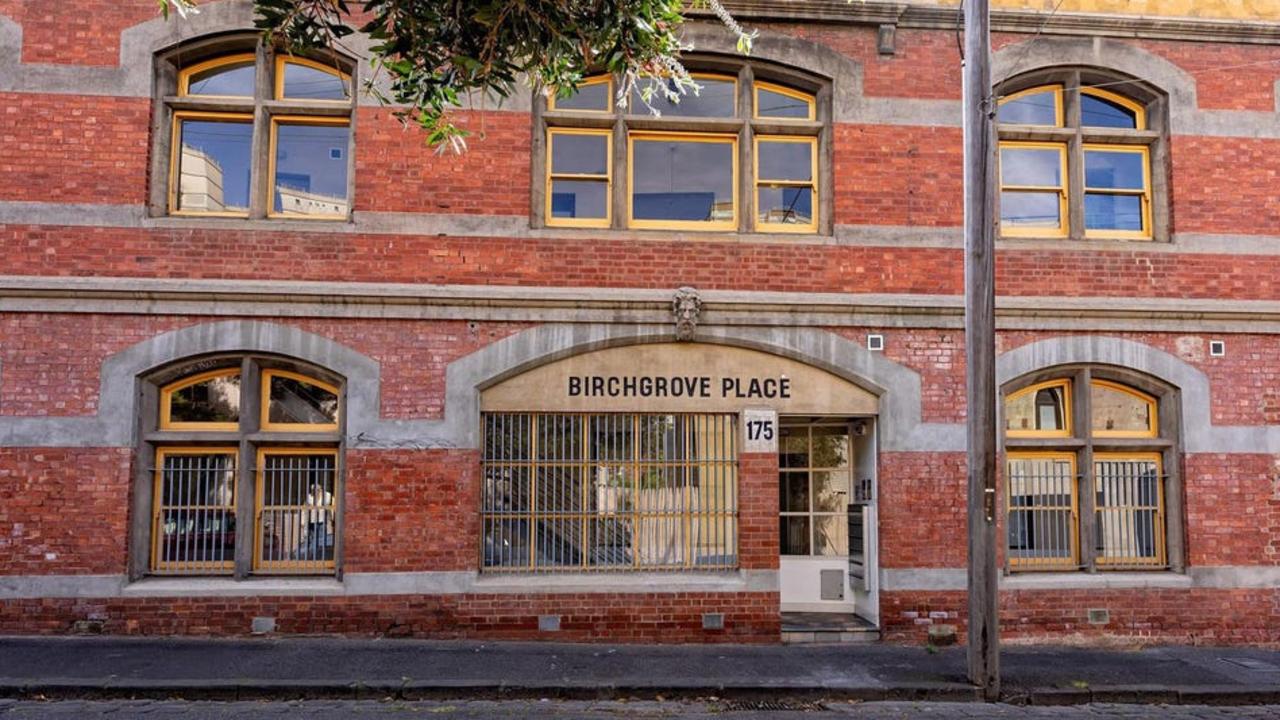 An apartment at 4/175 Fitzroy St, Fitzroy, in a warehouse conversion that used to be a clothing and furniture manufacturer, will also be auctioned today.