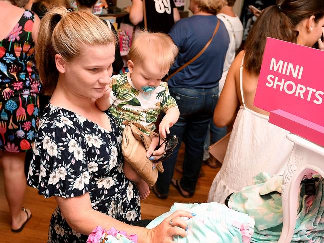 Breanna Beale with nephew Felix Hirst check out the sales in Peter Alexander. Picture: Tony Martin