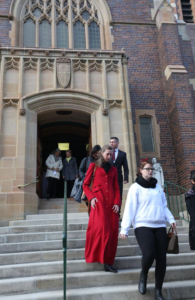 People leave the church after Sister Philomene Tiernan’s memorial. Picture: Damian Shaw