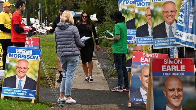 Residents make their way to a polling station to cast their vote at the Australian general elections in Cook electorate of Sydney on May 21, 2022. Picture: SAEED KHAN / AFP