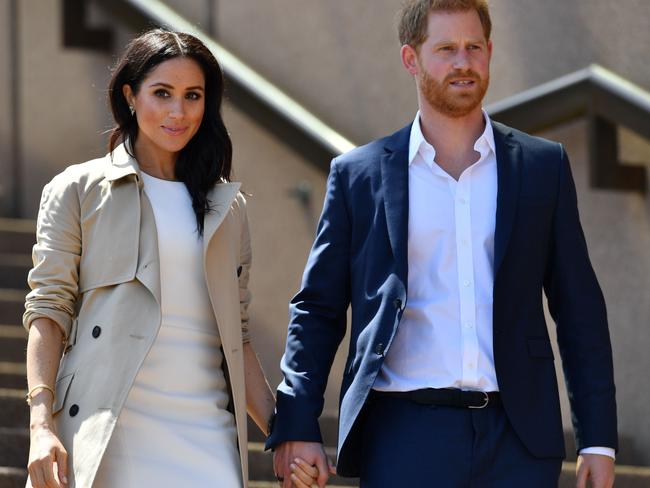 Britain's Prince Harry and his wife Meghan at the Sydney Opera House during their 2018 tour. Picture: Saeed Khan/AFP