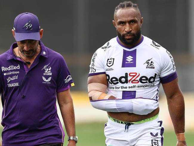 MELBOURNE . 12/02/2023.  NRL. Trial game. Melbourne Storm vs Sydney Roosters at Kardinia Park.  Storms Justin Olam heads to the sheds after breaking his arm early . Pic: Michael Klein