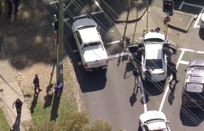 A wild car chase has come to a dramatic end with two people arrested after speeding recklessly across Sydney for close to an hour. Photo: 9 News