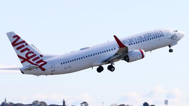 SYDNEY, AUSTRALIA - NewsWire Photos JUNE 10, 2022: Virgin Plane takes off at Sydney airport. Picture: NCA NewsWire / Damian Shaw