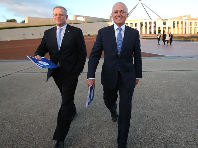 Men on a mission: Treasurer Scott Morrison and PM Malcolm Turnbull walking out the front of Parliament House in Canberra. Picture: Kym Smith by kym Smith