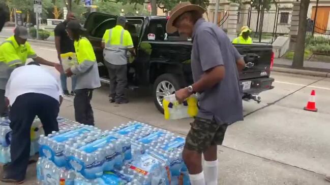 Houston Volunteers Prepare Water Donations for Jackson, Mississippi.