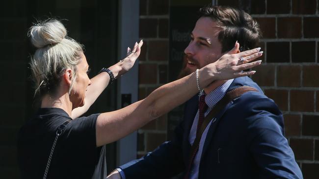 Kirsty Dayment seen hugging lawyer William Martyr outside Waverley Local Court on Tuesday. Picture: NCA Newswire