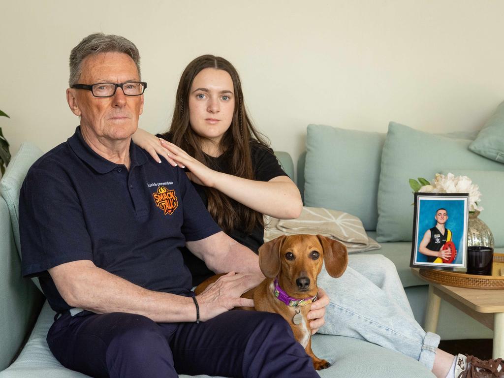 Wayne Holdsworth and his daughter Daisy. Photographed on the right is his son, Mac, who lost his life to suicide in 2023. Picture: Jason Edwards