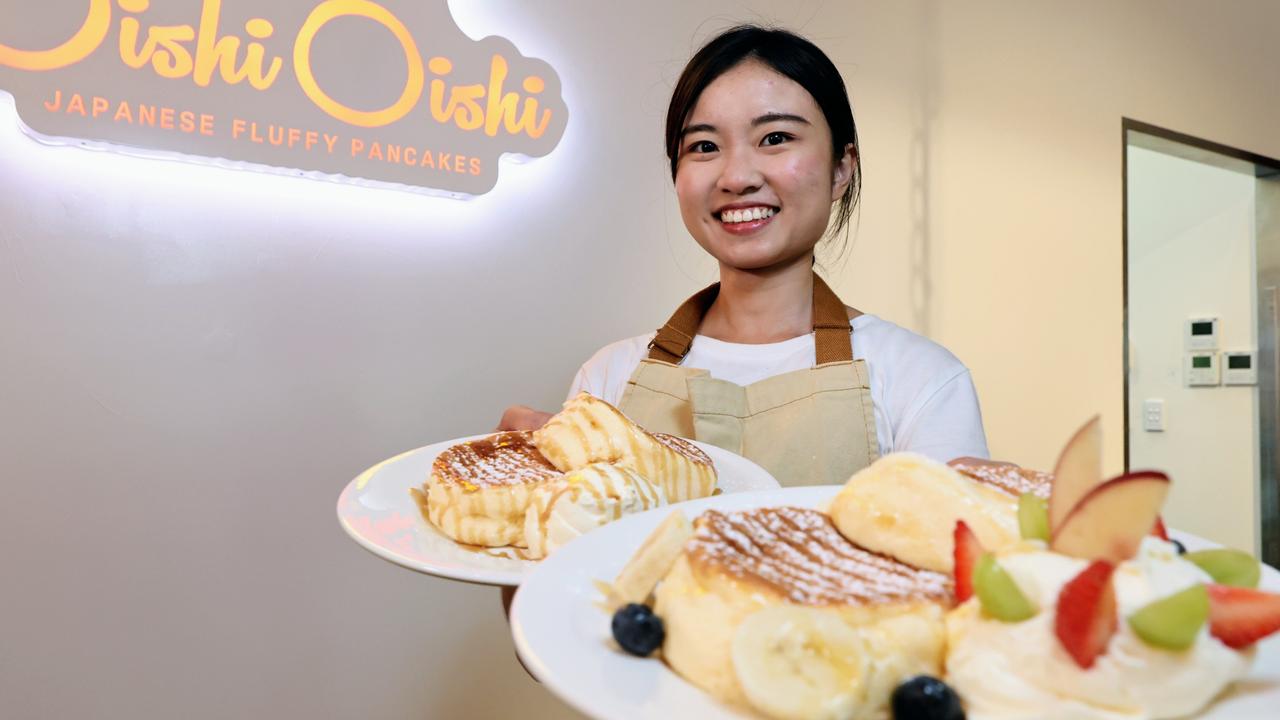 Oishi Oishi chef Miranda Lee serves up two dishes of Japanese fluffy pancakes to hungry customers. Picture: Brendan Radke