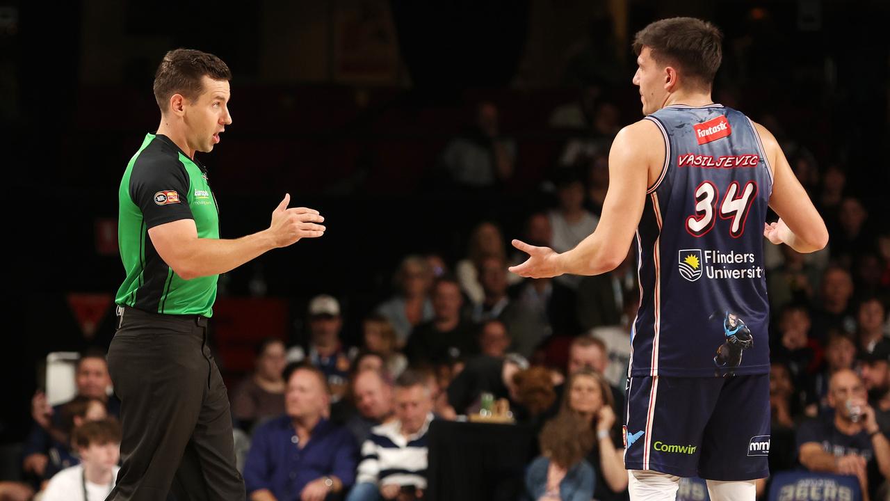 Referee Mitch Hare talks to 36ers star Dejan Vasiljevic on Saturday night. Picture: Sarah Reed/Getty Images