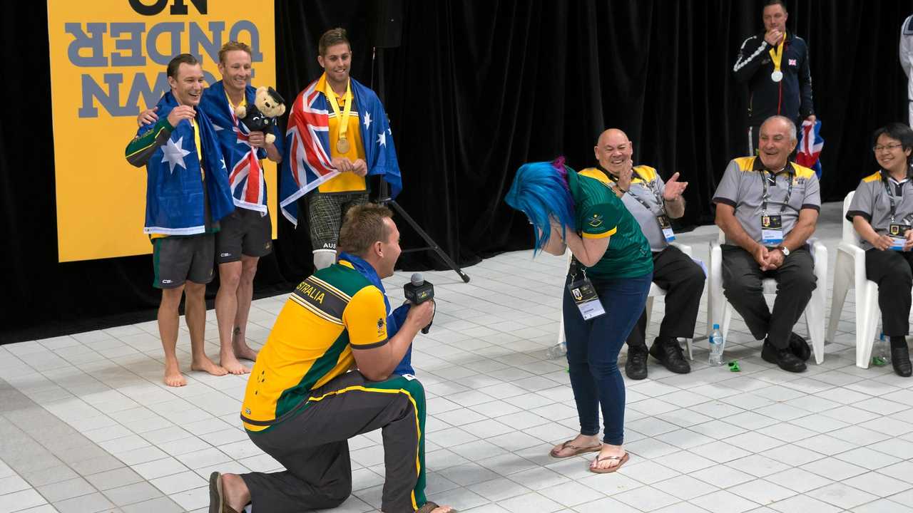 INVICTUS GAMES PROPOSAL: Former Mullumbimby veteran Dean Knobel proposed to his girlfriend Rachael Wilson moments after his team took gold in the Mixed 4x50m Freestyle Relay. Picture: CPL Jake Sims