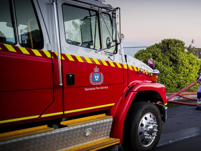 Tasmania Police and Tasmania Fire Service attend a house fire in Lucinda Parade, Lutana.  Richard Jupe