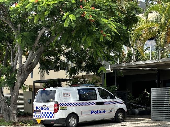 Police at the scene of a complex on the corner of King and Sandy Streets where the bodies of Bryan Monk and Janice Walker were found inside.