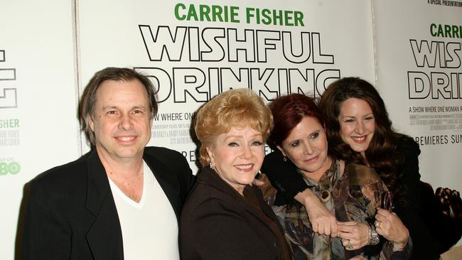 Todd Fisher, Debbie Reynolds, her daughter Carrie Fisher, and Joely Fisher at a premiere in Los Angeles in 2010. Picture: AFP