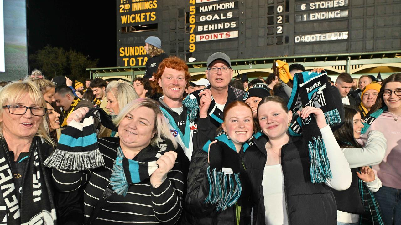 SEPTEMBER 13, 2024: Port fans Bel Armenio, Kim Henley, Amelia Vitler, Ava McKee, Jack Whitehead and Erin Vitler on the Hill during the Port v Hawthorn semi final at Adelaide Oval. Picture: Brenton Edwards