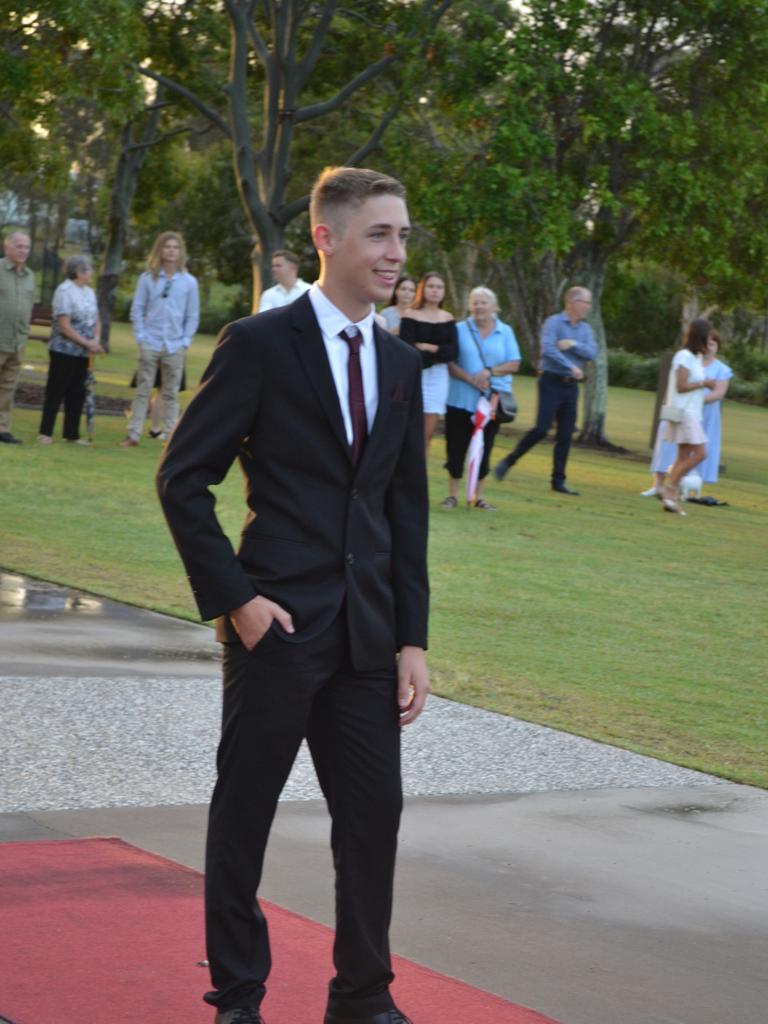 Tom C arrives at the St James Lutheran College formal.