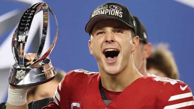 Brock Purdy of the San Francisco 49ers holding the George Halas Trophy after winning the NFC Championship Game. Picture: Ezra Shaw/Getty Images