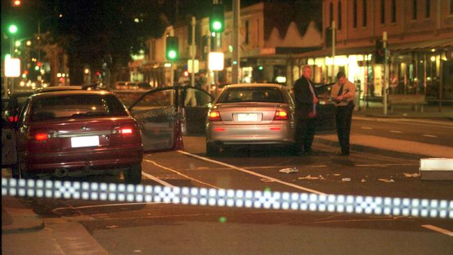 Police at the scene of the murder of Victor Peirce in 2002. Picture: Nicole Garmston