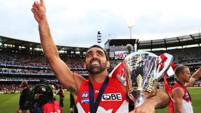 Adam Goodes celebrates with the cup after the Swans won the 2012 AFL Grand Final.