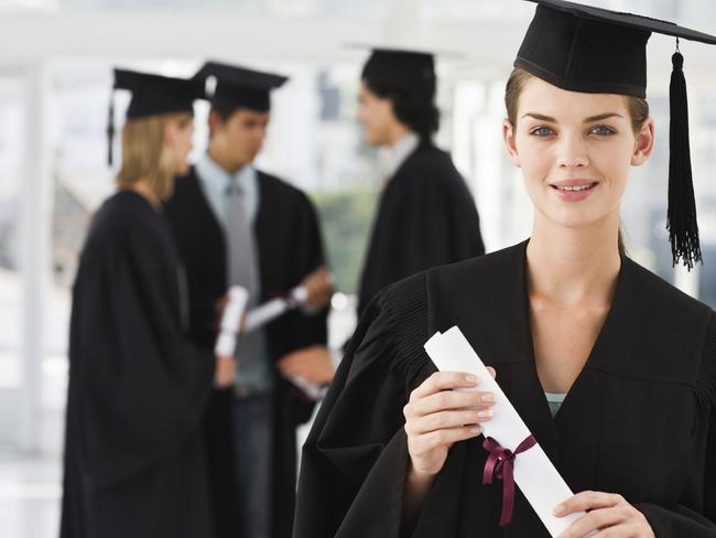 ONE TIME USE ONLY. ISTOCK IMAGE. CareerOne cover - graduate holding a diploma / wearing gown / mortar board