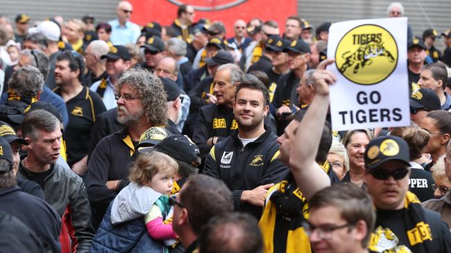 Fans congregate at Glenelg’s chimney unveiling at West End Brewery on Tuesday. Picture: TAIT SCHMAAL.