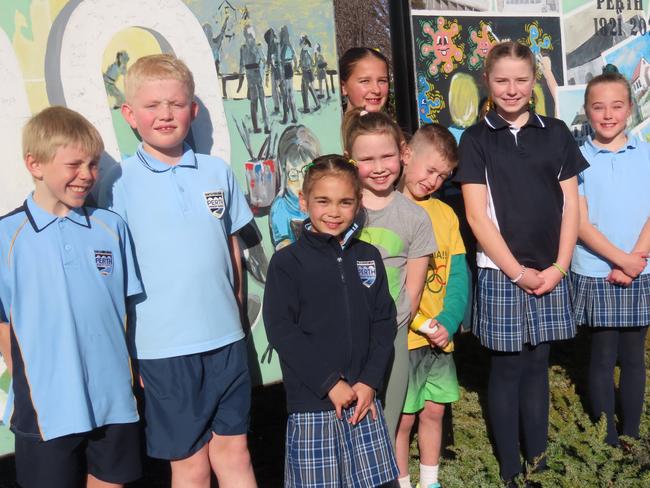 Perth Primary students Angus Flanigan, Cooper Mitchell, Maggie Cullen, Isla Smith, Phoenix Longmore, Archie Dawson, Evie Whitchurch, and Charlotte Bass outside the school earlier this week. Picture: Jon Tuxworth