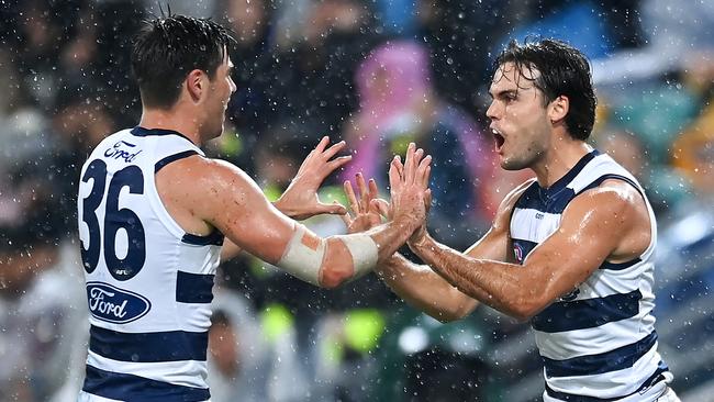 BRISBANE, AUSTRALIA - APRIL 20: Jack Bowes of the Cats celebrates kicking a goal during the round nine AFL match between Brisbane Lions and Geelong Cats at The Gabba, on April 20, 2024, in Brisbane, Australia. (Photo by Albert Perez/AFL Photos via Getty Images)