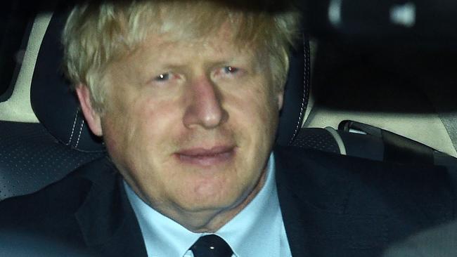 Boris Johnson is driven away from the Houses of Parliament after the vote. Picture: AFP.