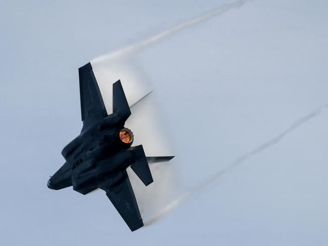 (FILES) A US Marine Corps F-35B Lightning II, a short takeoff and vertical landing (STOVL) version of the Joint Strike Fighter aircraft, flies past during a preview of the Singapore Airshow in Singapore on February 13, 2022. A stealth-capable US fighter jet vanished on September 17, 2023 -- not from prying eyes but rather from the American military, prompting an unusual call to the public to help locate the missing multimillion-dollar plane. After what authorities labeled a 
