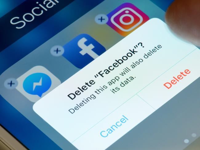 Antibes, France - February 21, 2018: User deletes Facebook app from iPhone. The social media platform faces increased scrutiny around personal data privacy and its handing of fake news and extremist content.