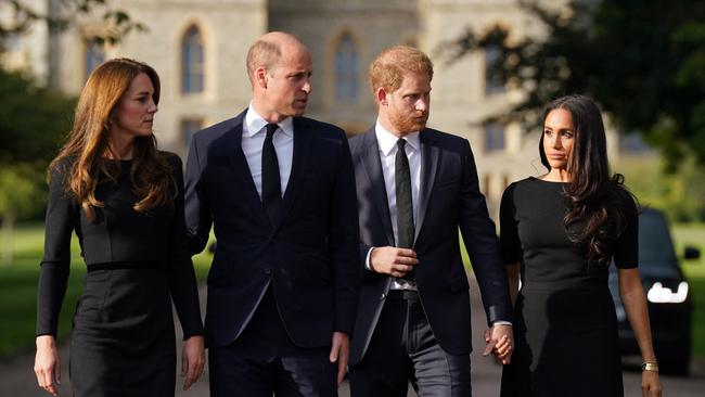 Catherine, Princess of Wales, Prince William, Prince of Wales, Britain's Prince Harry, Duke of Sussex, and Meghan, Duchess of Sussex on the long Walk at Windsor Castle in 2022, before meeting wellwishers. Picture: Kirsty O'Connor / pool / AFP