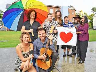 Promoting the free community gathering to mark one year since the 2017 March flood are (front) musicians Kate Stroud from Lady Mondegreen and Luke Vassella with (rear l-r) organiser and Lismore City Councillor Elly Bird and performers from The Overtopping Mike Smith, Tom Kelly, Chris Wilkinson, Zeb Schulz and Sunita Bala. Picture: Terra Sword