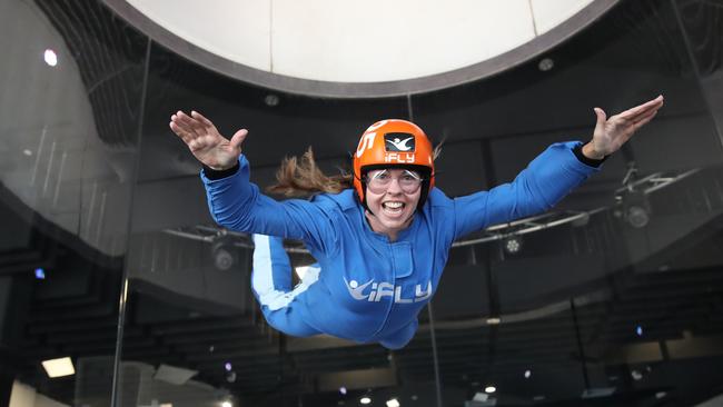 Lisa and Duncan Smith with children Isabelle 10, and William 8, at I Fly in Surfers Paradise thanks to Play Money. The Flying Mum, Lisa Smith , getting high thanks to Play Money. ... Picture Glenn Hampson