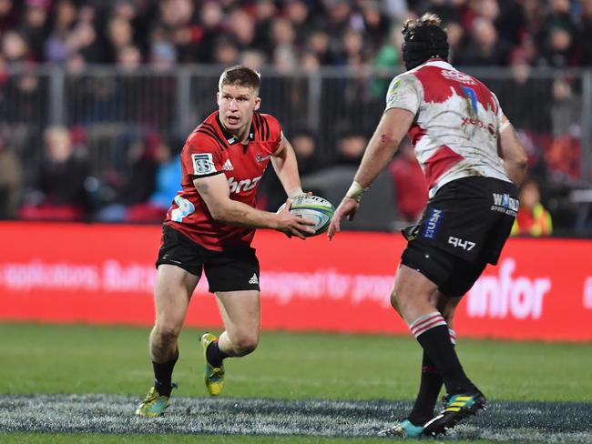 Jack Goodhue looks to pass the ball during the Super Rugby Final. Picture: Getty Images