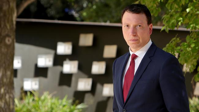 Dr Dvir Abramovich at the Raoul Wallenberg Memorial garden, St Kilda has spoken out against rising anti-Semitism. Picture: Stuart McEvoy, The Australian.