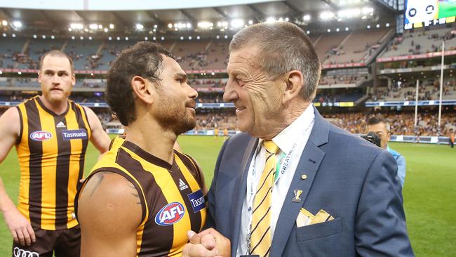 Former Hawthorn president Jeff Kennett congratulates Cyril Rioli. Pic: Michael Klein.