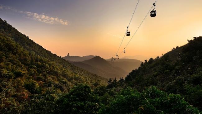 Take the Ngong Ping Cable Car to Hong Kong's Lantau Island.