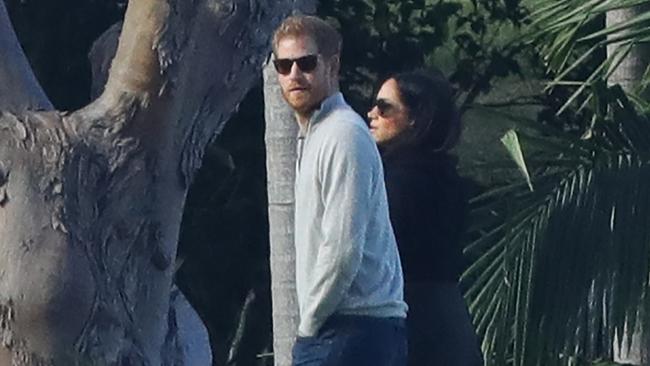 Harry and Meghan in the gardens of Admiralty House. Picture: Matrix