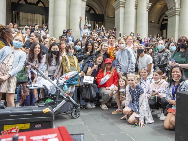 Tones and I poses with fans at Bourke St after her pop up concert. Picture: Tim Carrafa