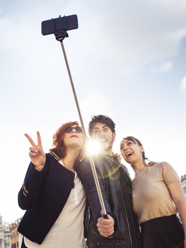 Selfie sticks are often used, especially by tourists, to get the best pictures.