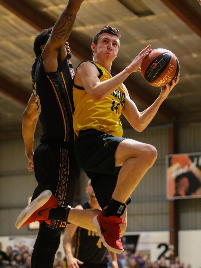 Woodville’s Brodie Nathan getting to the basket. Picture: Rod Patterson