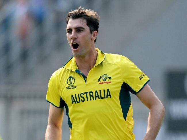 AHMEDABAD, INDIA - NOVEMBER 19: Pat Cummins of Australia celebrates the wicket of Shreyas Iyer of India  during the ICC Men's Cricket World Cup India 2023 Final between India and Australia at Narendra Modi Stadium on November 19, 2023 in Ahmedabad, India. (Photo by Gareth Copley/Getty Images)