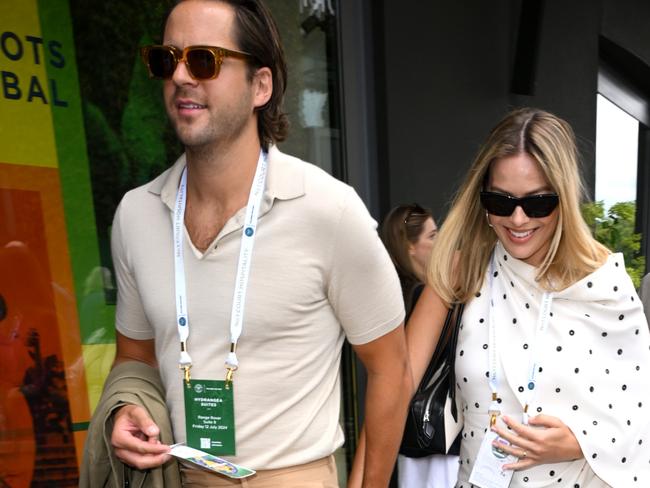 Tom Ackerley and Margot Robbie attend day twelve of the Wimbledon Tennis Championships. Picture: WireImage