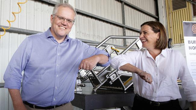 Scott Morrison and state Opposition Leader Deb Frecklington visit Meridian Helicopters in Townsville on Wednesday. Picture: Sarah Marshall