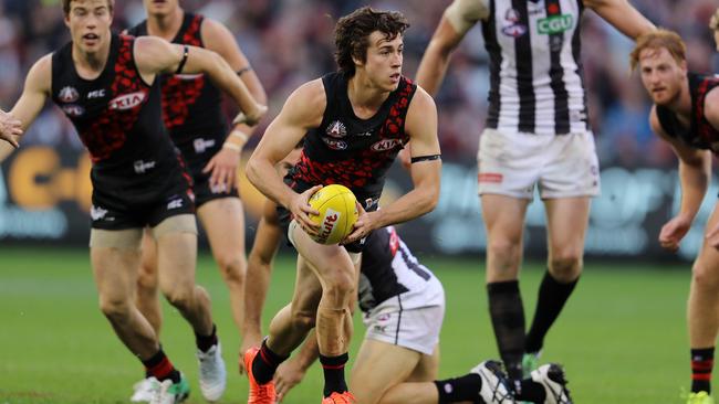 AFL Round 5. Essendon vs. Collingwood at the MCG . Essendon's Andrew McGrath clears from the congestion . Pic: Michael Klein