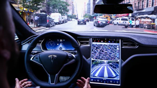 A driver rides in a Tesla Motors Inc. Model S vehicle equipped with Autopilot hardware and software. Picture: Christopher Goodney / Bloomberg News