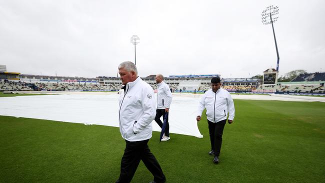 The umps are having a look — positive signs. Photo by Ryan Pierse/Getty Images)