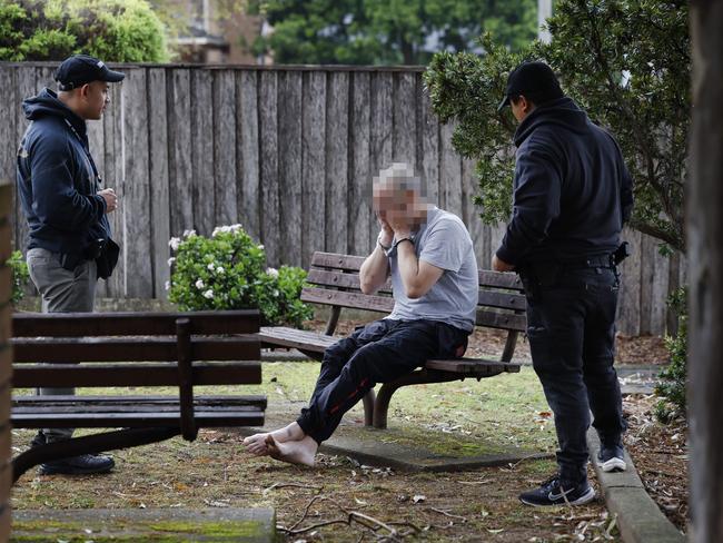 The suspect sobs as he contemplates a return to jail after being arrested for breaching an AVO. Picture: Richard Dobson