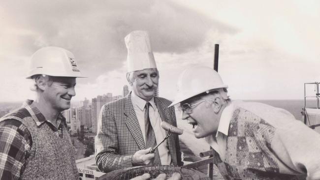 Pat Zarro also built the Surfers Manhattan tower on the Gold Coast. He’s picture here celebrating its completion with labourer Peter Sweet and White Industries operations manager Alan Anderson.